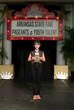 NE Region winner: Abby Bone, 13m of Clinton, clogged her way across the stage to "Freestyle."